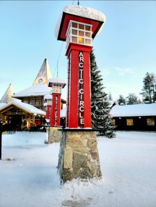 Crossing the Arctic Circlle at Santa Claus Village