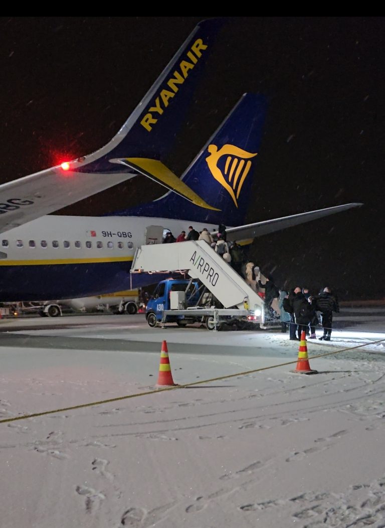 Ryanair plane at Rovaniemi Airport in snowy Lapland, Finland