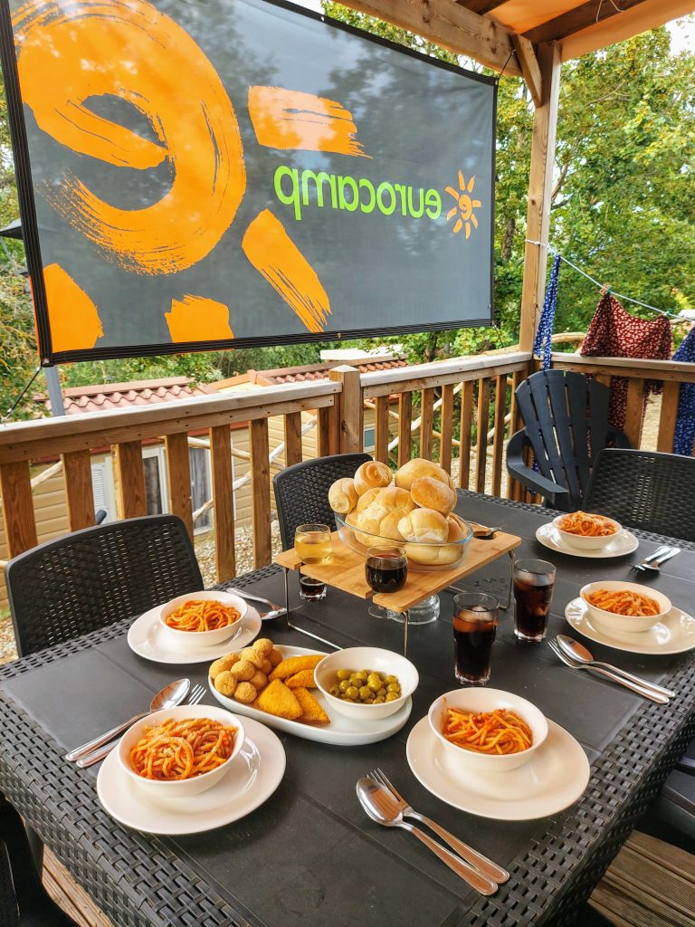 Eurocamp caravan deck with meal at the table
