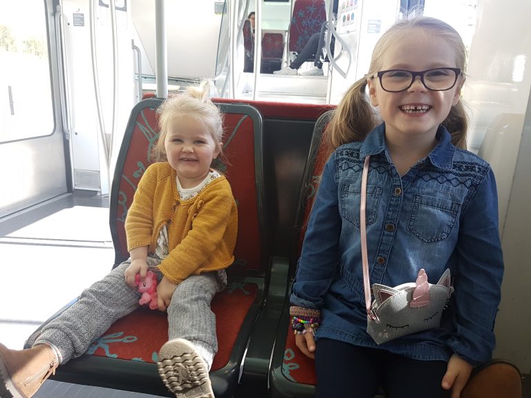 Paris Metro train seats with children