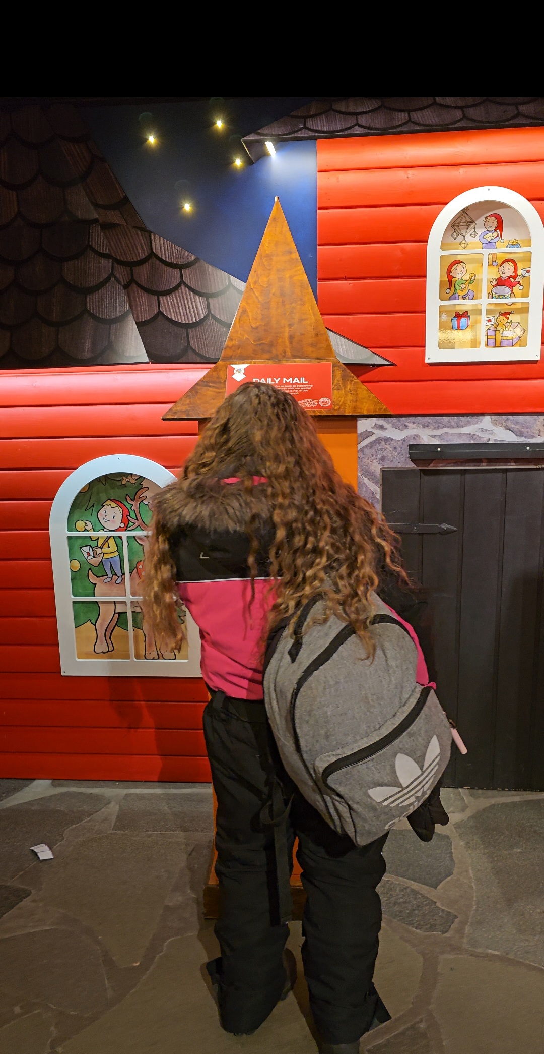 Inside Santa Claus Main Post Office in Santa Claus Village, Rovaniemi, where visitors can send postcards with the official Arctic Circle postmark.
